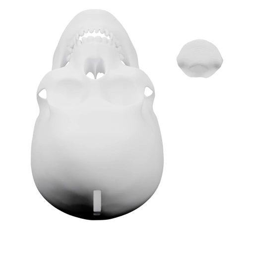 Скульптура с открытым ртом и острыми зубами