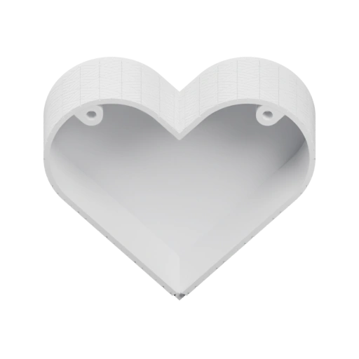 Имеет форму сердца с внутренним отверстием и выступами для крепления