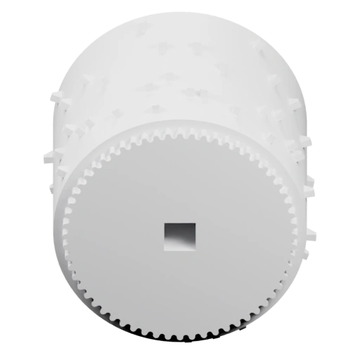 Круглый объект с зубчатым кольцом и отверстием в центре