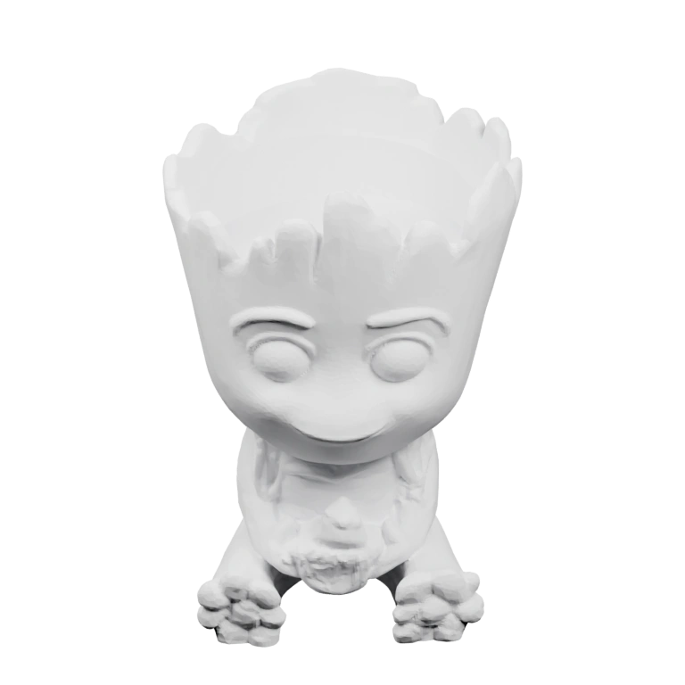 Маленькая фигурка с круглой головой и руками, сидящая на ножках