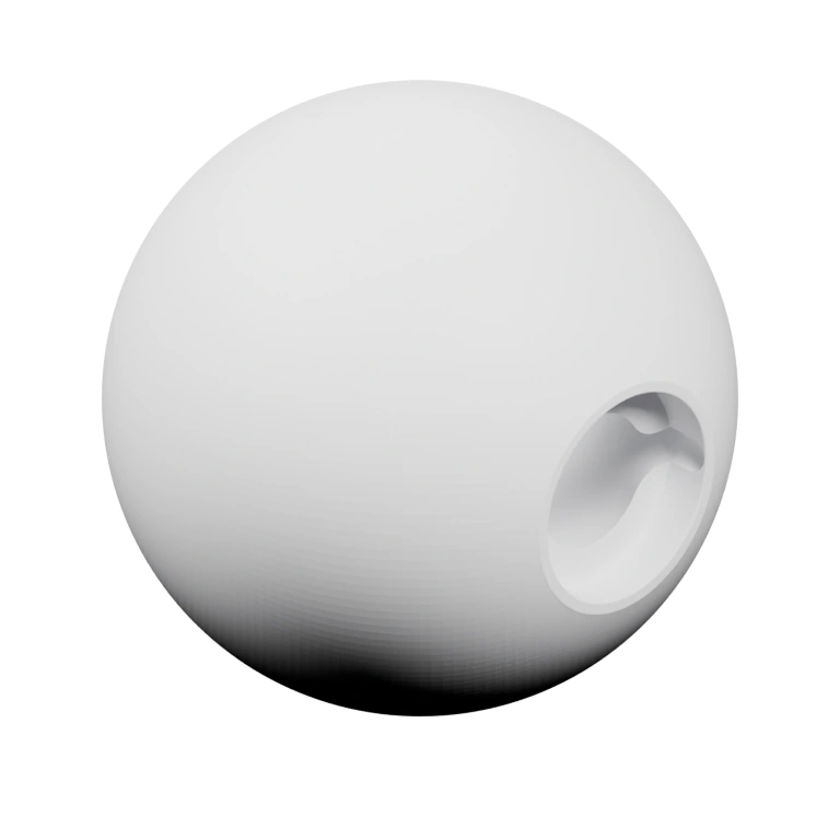 Маленький круглый объект с отверстием и выемкой