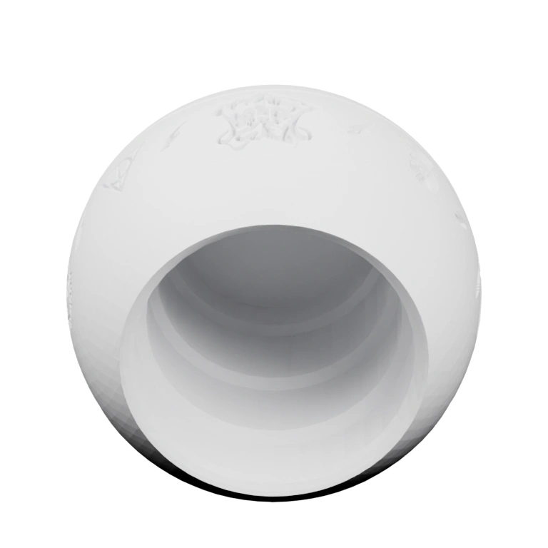 Округлый, с отверстием и рельефными узорами на поверхности