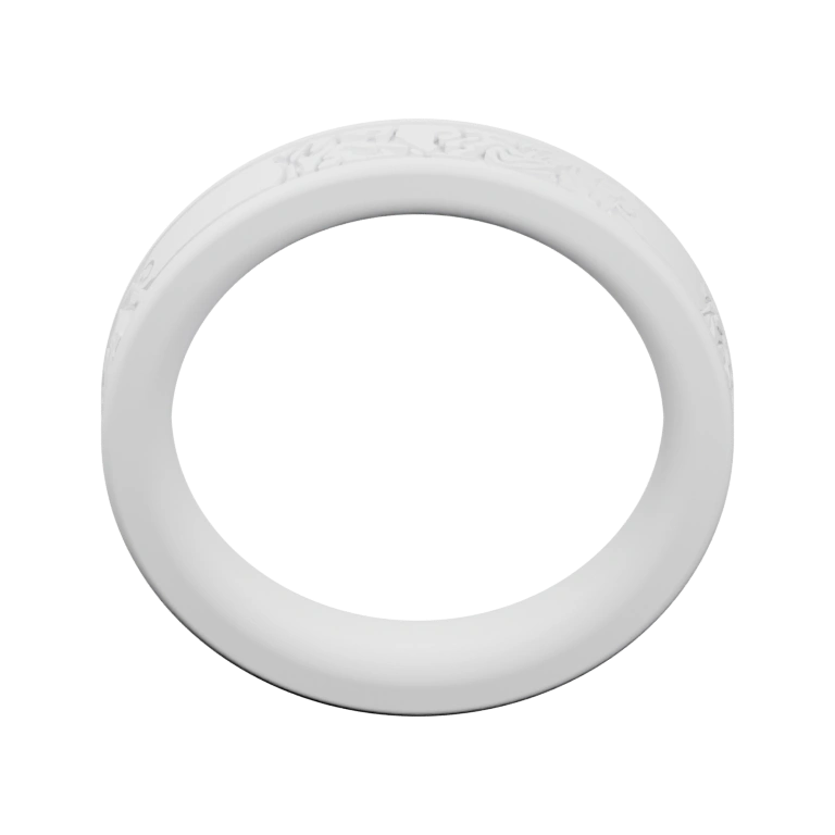 Круглый предмет с узорами по краю и текстом на боковой поверхности