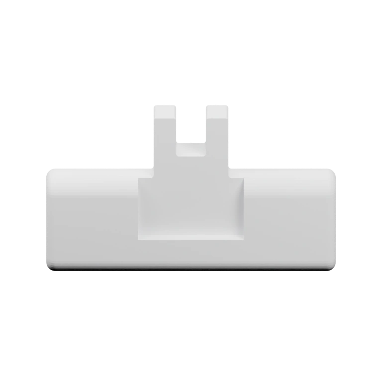 Имеет прямоугольную основу и выступы для фиксации